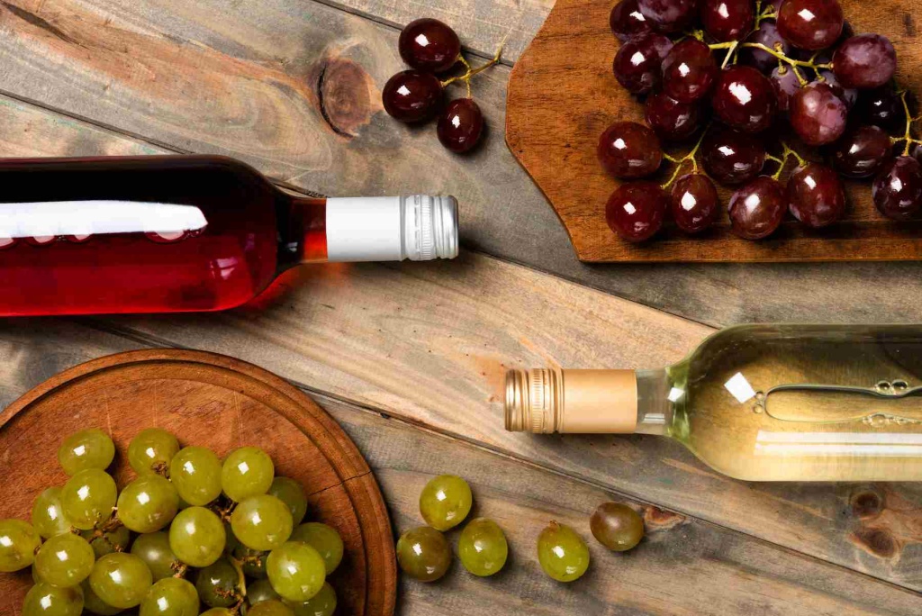 top-view-wine-bottles-with-grapes (1).jpg